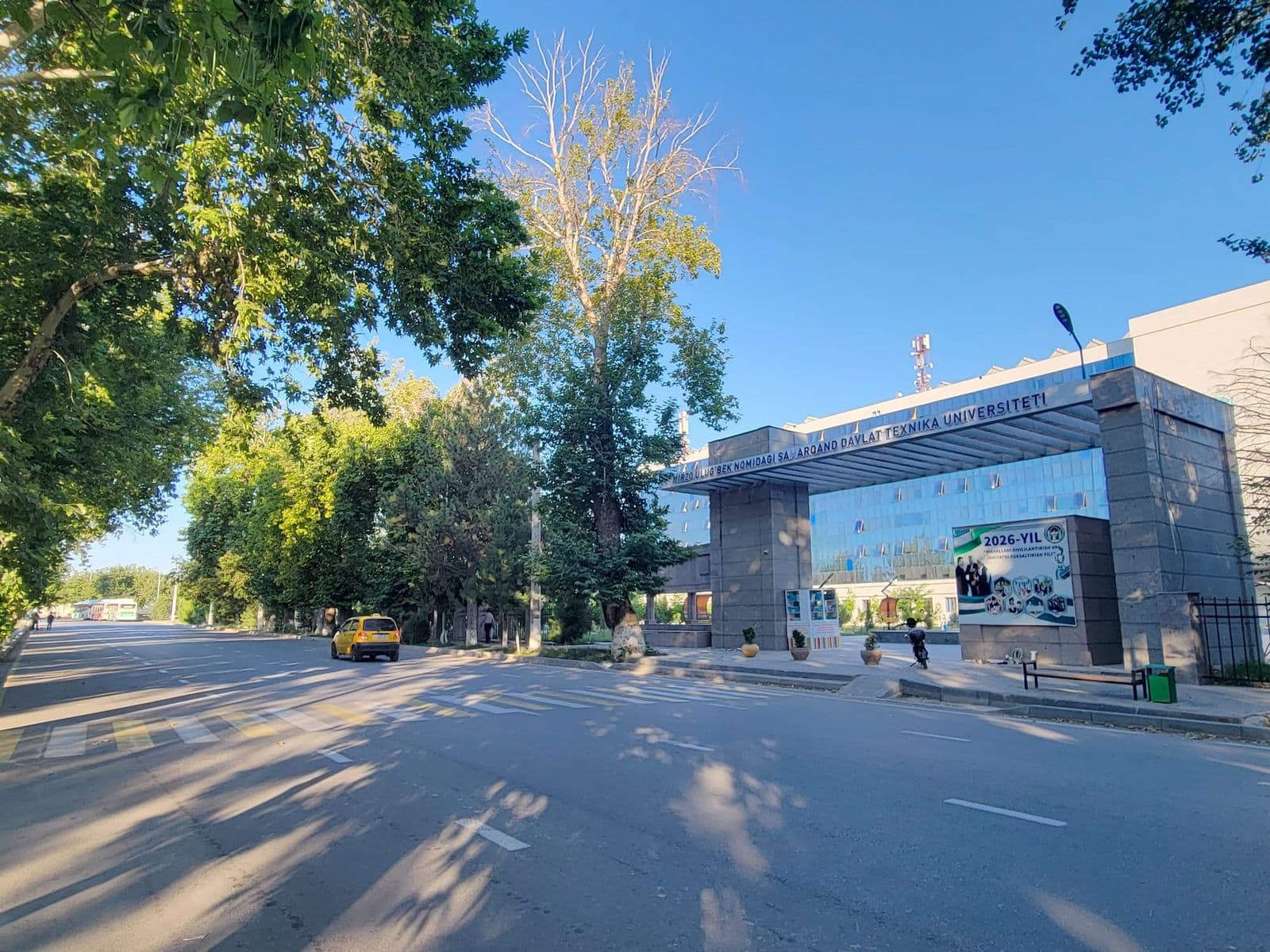 The university gate seen from the street in the morning