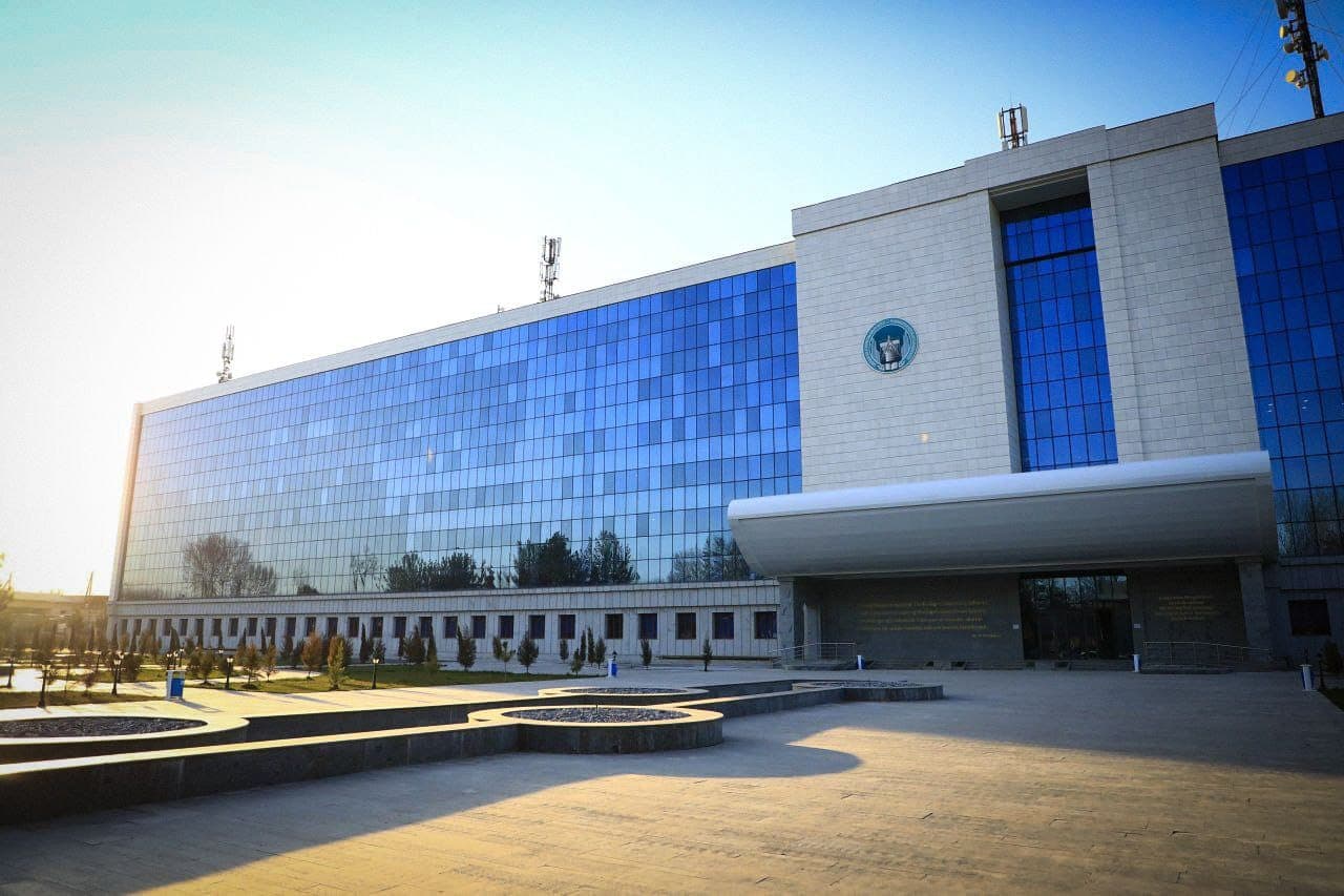 The main academic building at sunset